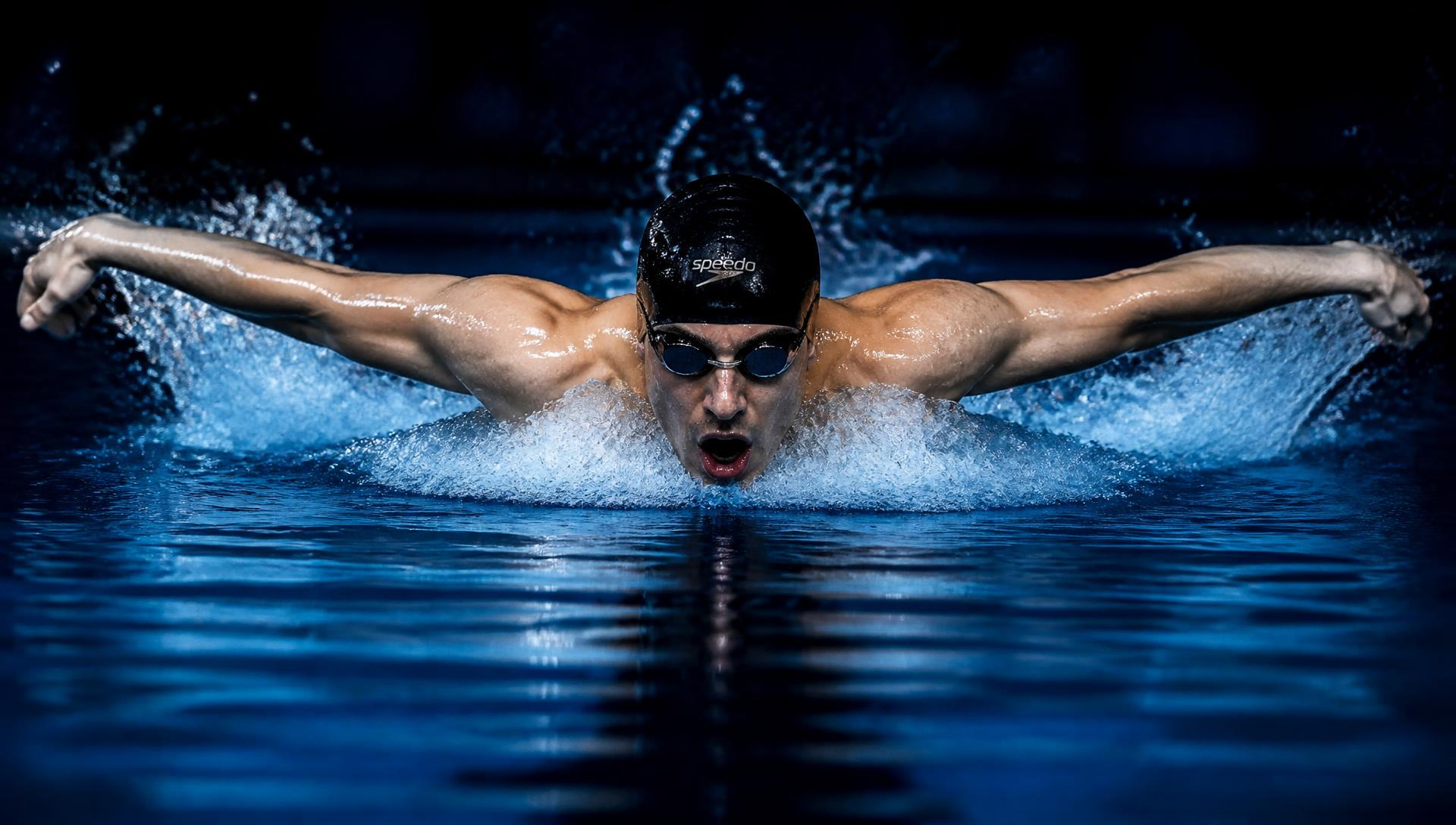 Swimmer powering through a butterfly stroke